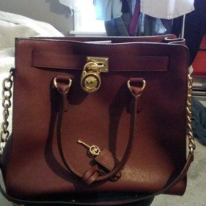 Genuine Micheal Kors handbag with large gold lock